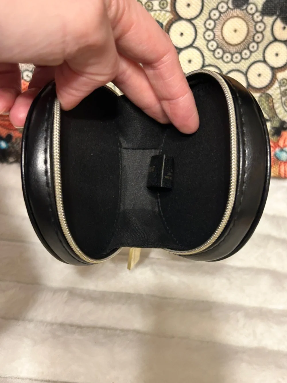 Yves Saint Laurent Black Round Leather Travel Case with Gold Tag
